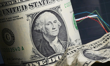 Курс доллара в начале торгов Мосбиржи вырос на 16 копеек