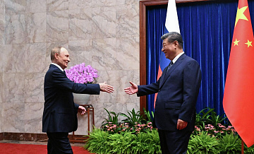 Путин одержал дипломатическую победу, пишет Bloomberg 