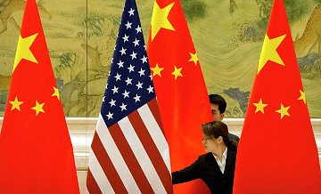 Китай будет сотрудничать с членами ВТО для противостояния политике США