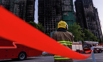 Число погибших при пожаре в Гонконге достигло 168