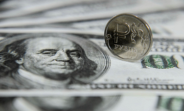 Рубль укрепился к доллару и евро